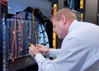 What does a telecommunications equipment technician do?